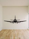 Adesivo de parede avião aterrissando